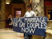 English: This protester was on his own and letting Minnesota state Senators know his position on gay marriage. This is freedom of speech in action.