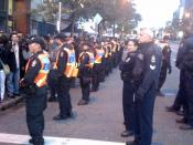 English: Vancouver police block the north sidewalk of East Hastings Avenue during a benefit barbecue and concert for Vancouver's safe injection site, Insite. Police prevented the concert from going ahead, as organizers were not granted permits by the city