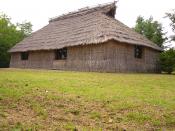 Photo of a reconstruction of an Ainu dwelling (cise) outside of the Nibutani Ainu Culture Museum in Nibutani, Hokkaido, Japan