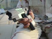 Advanced M26 TASER Stun Pistol - The United States military version of commercial TASERs for non-lethal detainment.