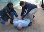 Two United States Marshals arrest a suspect.
