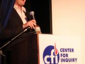 English: James Underdown director of CFI West gives an award for outstanding critical thinking on television for the show 