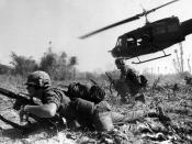 English: Major Crandall's UH-1D helicopter climbs skyward after discharging a load of infantrymen on a search and destroy mission.