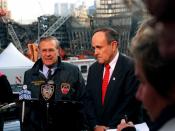 Secretary of Defense Donald Rumsfeld (left) and New York Mayor Rudy Giuliani (right) hold a joint media availability at the site of the World Trade Center disaster in lower Manhattan, on Nov. 14, 2001. Rumsfeld is visiting the site of the Sept. 11th disas