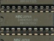 A 256Kx4 Dynamic RAM chip on an early PC memory card. (Photo by Ian Wilson)