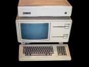 Apple Lisa with a ProFile hard drive stacked on top of it.