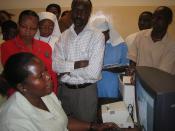 Members of Tanzania's Health and ICT network see a health management information system in action
