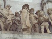 English: Rinconete and Cortadillo. Stone sculptural group made by Federico Coullaut-Valera Mendigutia (1912–1989). Added in 1960 to the monument to Cervantes (1925–30, 1956–57) at the Plaza de España (