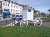 English: White cart near King George III statue