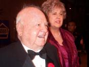 English: Actor comedian Mickey Rooney, 80, and his wife, Jan, arrive with at a military concert in Beverly Hills, California. DoD and the USO hosted the November 30th concert to honor the Hollywood film industry. Starting in vaudeville at age 15 months an