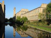 English: Titus Salt's mill in Saltaire, Bradford is an UNESCO World Heritage Site. Leeds to Liverpool Canal, Saltaire. Mill buildings built by Sir Titus Salt. Saltaire mills from the Leeds and Liverpool Canal. Salts Mill (left) and the New Mill (right) fr