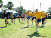 English: SAN DIEGO (Sept. 3, 2009) Fred Fusilier, lead personal trainer at Naval Medical Center San Diego, leads a fitness aerobics class during the Health and Wellness Department Fitness Expo. The event featured health and wellness educational booths and