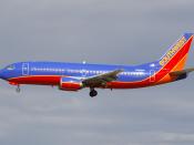 English: Southwest Airlines 737-300 N310SW. I took this photo of a Southwest Airlines Jet landing at Baltimore-Washington International Thurgood Marshall Airport on March 4, 2007 from the airplane observation area on airport grounds. This image is a crop 