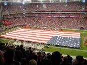 English: The stars and stripes unfurled during the National Anthem at University of Phoenix Stadium