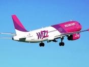 A Wizz Air Bulgaria Airbus A320-200 departs London Luton Airport, England