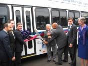 Congressman Honda lends San Jose Councilmember Forest Williams a hand at the ribbon cutting ceremony for the Zero-Emission Hydrogen Fuel Cell Bus Program.