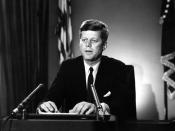 President Kennedy delivers radio and television address on the Limited Nuclear Test Ban Treaty. White House, Oval Office.