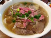 Vietnamese phở noodle soup with sliced rare beef and well done beef brisket from Pho Hoang in Springvale, Victoria, Australia.