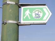 A sign marking a footpath on the London LOOP walk. I took this photo myself and I'm releasing it into the public domain. After all, I didn't design the sign or the logo, so it seems morally wrong for me to claim any rights to its likeness. Category:Images