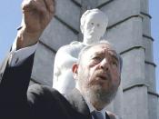 Castro, in 2002, beneath a statue of José Martí