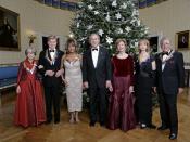 English: President George W. Bush and Laura Bush pose with the Kennedy Center honorees, from left to right, actress Julie Harris, actor Robert Redford, singer Tina Turner, ballet dancer Suzanne Farrell and singer Tony Bennett, Sunday, December 4, 2005, du
