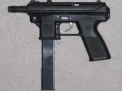 An Intratec TEC-DC9 with 32-round magazine; a semi-automatic pistol formerly classified as an Assault Weapon under Federal Law.