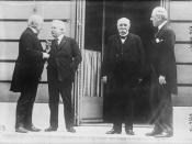 English: Photograph of the Big Four at the Paris peace conference after World War I on May 27, 1919. From left to right: British Prime Minister David Lloyd George, Italian Premier Vittorio Orlando, French Premier Georges Clemenceau and President of the Un