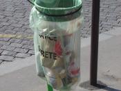 A public waste bag in Paris displaying the inscription 