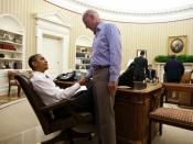 English: President Barack Obama and Vice President Joe Biden shake hands in the Oval Office following a phone call with House Speaker John Boehner securing a bipartisan deal to reduce the nation's deficit and avoid default, Sunday, July 31, 2011. (Officia