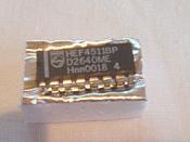 English: A Philips HEF4511 IC.