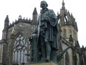 English: Adam Smith statue in Edinburgh's High Street with St. Giles High Kirk behind.