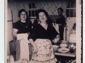 Women in a kitchen preparing a meal
