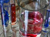 Red and blue substances in transparent test tubes