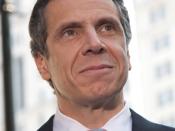 English: Andrew Cuomo, 11th United States Secretary of Housing and Urban Development and 64th New York State Attorney General as a candidate for Governor of New York, outside of City Hall, little American flags on his tie.
