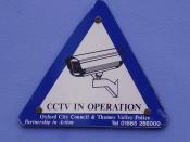 'CCTV in operation' sign in a street in Oxford, England (UK).