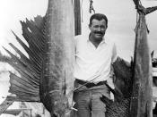 Portrait of author Ernest Hemingway posing with sailfish: Key West, Florida