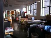 The Etsy office's community workspace area.