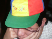 English: photo of someone wearing a Google NOOGLER hat.