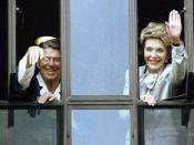 President Ronald and First Lady Nancy Reagan wave from a Bethesda hospital window after the President's cancer surgery in 1985. Both Reagans would eventually be patients at the hospital again.
