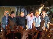 Toto on stage at the Summer Tour 2004 in Modena, Italy, July 11th 2004. From the left: Tony Spinner, David Paich, Bobby Kimball, Steve Lukather, Simon Phillips, Mike Porcaro