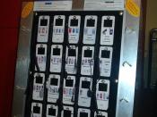 English: Pay-per-charge phone charger array in a Thai shopping center