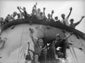 English: AWM Caption: ALEXANDRIA, EGYPT, 1940-07-22. CREW MEMBERS OF HMAS SYDNEY WAVE GREETINGS FROM THE TOP OF AND A SHELL HOLE IN ONE OF THE SHIP'S FUNNELS. THE SAILOR FIFTH FROM THE LEFT IN THE TOP GROUP IS LEADING STOKER THOMAS NEVIN GLACKIN.
