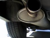 Muffler and tail pipe on a car