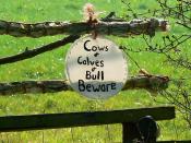 English: Sign on stile, near No Parish Farm Despite the ambiguity the message is clear: keep out if you know what's good for you.