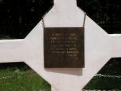 English: The memorial plague hanging temporarily on the Long Tan cross.
