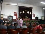 Gangwashi Church is the largest one in Beijing now. Here is a volunteer, who is teaching knowledge of The Bible for Christians