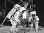 English: Two members of the Apollo 11 lunar landing mission participate in a simulation of deploying and using lunar tools on the surface of the Moon during a training exercise on April 22, 1969. Astronaut Buzz (Aldrin Jr. on left), lunar module pilot, us