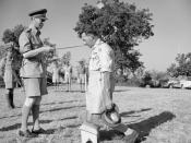 THE BRITISH ARMY IN ITALY 1944. King George VI knights General Sir Oliver Leese in the field.