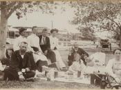 English: Christmas dinner with the Higlett family. Unidentified family enjoying a picnic at Moura? Park, Sandgate. Caption with photograph reads: 'Our Xmas Dinner 1905.' Possibly family of Rev. Higlett.