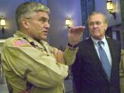 English: Baghdad, Iraq (July 27, 2005) - Commander of Multinational Force Iraq, U.S. Army Gen. George Casey and Secretary of Defense Donald Rumsfeld answer questions during a press conference at the U.S. Embassy in Baghdad, Iraq. Gen. Casey spoke about th